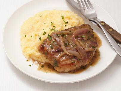Smothered pork chops and grits