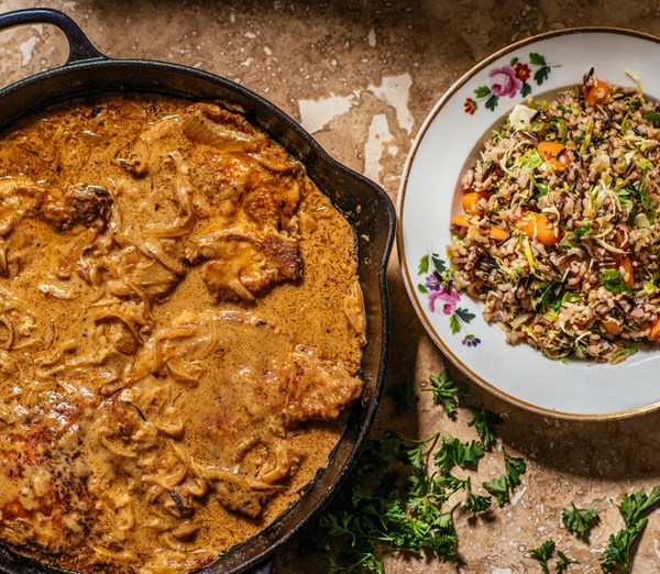 Smothered pork chops and wild rice plate lunch