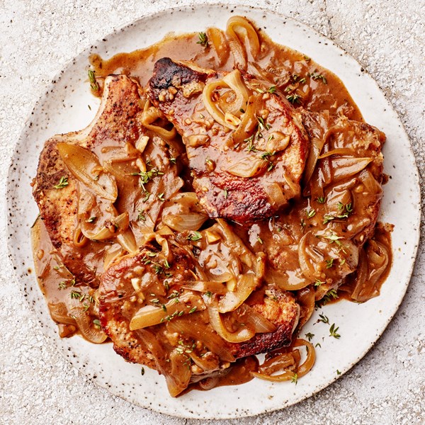 Smothered pork chops in potlikker gravy