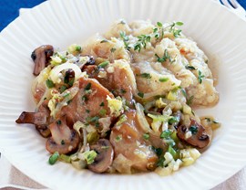 Smothered seitan medallions in mixed mushroom gravy
