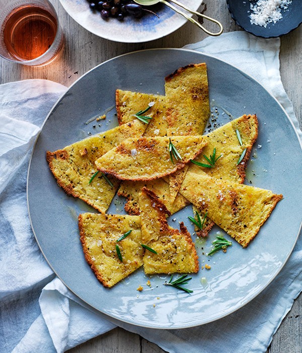 Socca with rosemary and olives