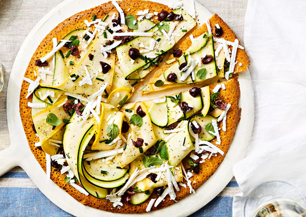 Socca with zucchini and olives