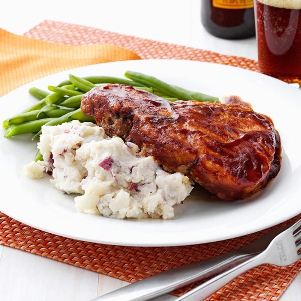 Soda pop chops with smashed potatoes