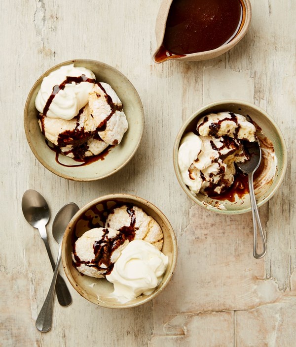 Soft amaretti with coffee sauce and whipped cream