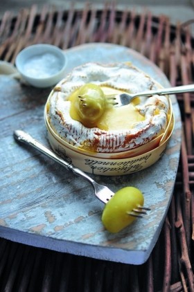 Soft baked cheese with boiled Jersey Royals
