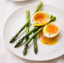 Soft boiled eggs with asparagus spears