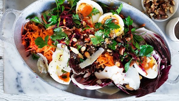 Soft-boiled eggs with beetroot, carrot and parsley salad 