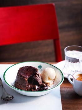 Soft-centred chocolate budini with milk ice-cream