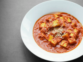 Soft cheese in a rich and creamy curry (Paneer butter masala)