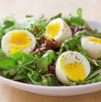 Soft-cooked eggs with salad