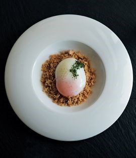 Soft free-range egg with almond bread crunch and sherry caramel