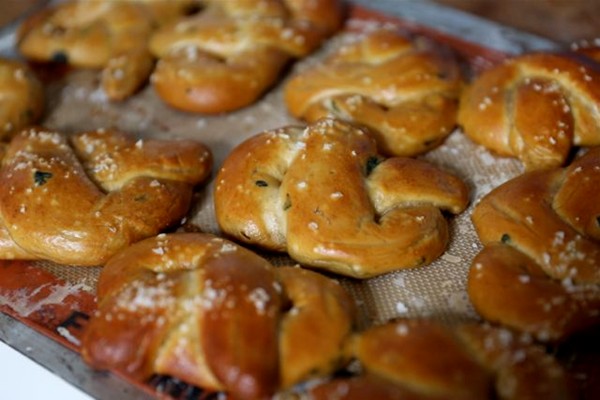Soft pretzels with cheese and sage