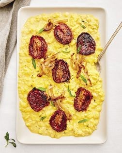 Soft scrambled eggs with oven-roasted tomatoes and caramelized onions