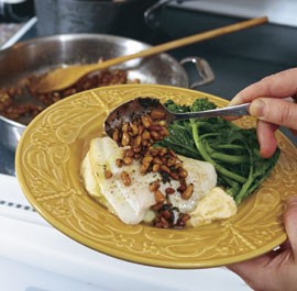 Sole fillets with pine nuts, lemon & basil