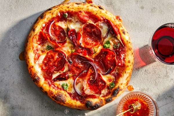 Sopressata pizza with Calabrian chile hot honey