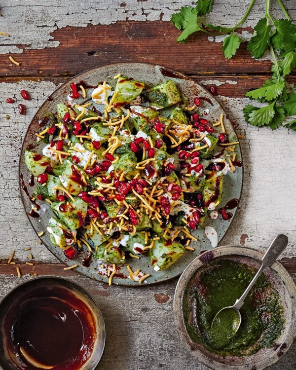 Sour and spicy potatoes (Alu chaat) with chutneys 