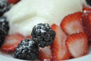 Sour cream-capped yogurt with sugared berries