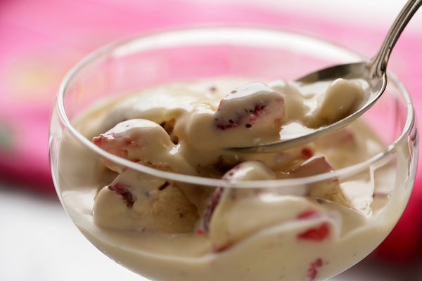 Sour cream ice cream with brown sugar strawberry swirl