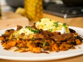 Sour orange pork with sweet potato hash and sofrito Hollandaise