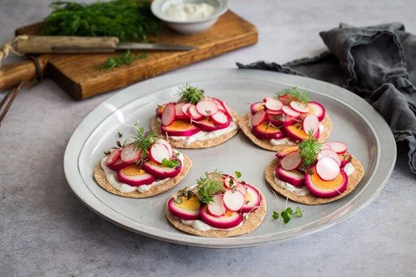 Sourdough crispbreads with beetroot-pickled eggs and dill and caper yoghurt