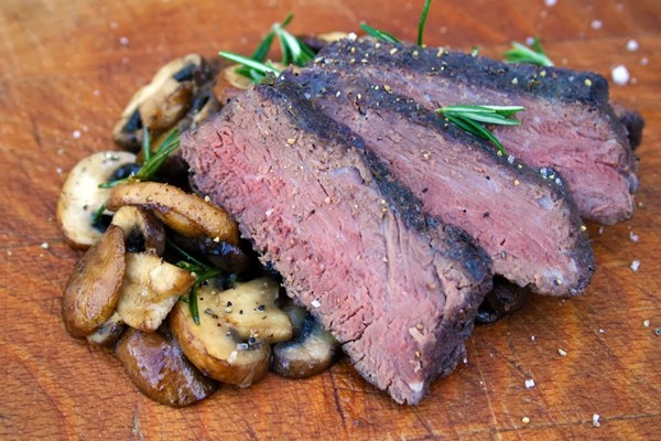 Sous vide kangaroo with rosemary mushrooms and blackberry vodka