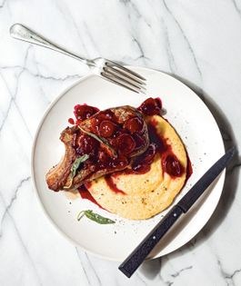 Sous vide pork chops with cherries and polenta