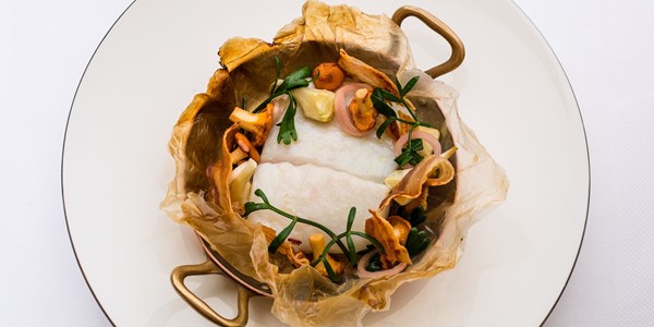 South coast turbot, smoked bacon, artichokes and girolles cooked in paper