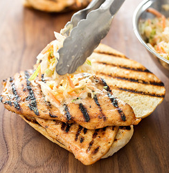 Southeast Asian grilled chicken sandwiches with spicy slaw