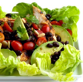 Southwestern grilled chicken salad with tomato and black bean salsa