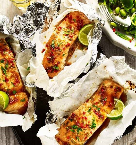 Soy and ginger salmon parcels with sesame sugar snap salad