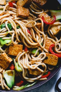 Soy-braised tofu and vegetable udon noodle stir fry