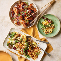Soy chicken wings and spring onion noodles