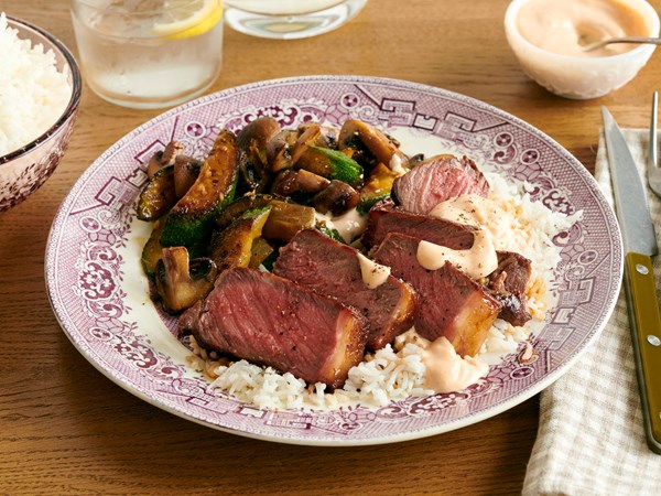 Soy-garlic steak with vegetables and yum yum sauce