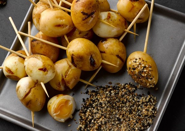 Soy grilled quail eggs with sesame salt