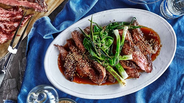 Soy sauce-marinated grilled flank steak and scallions