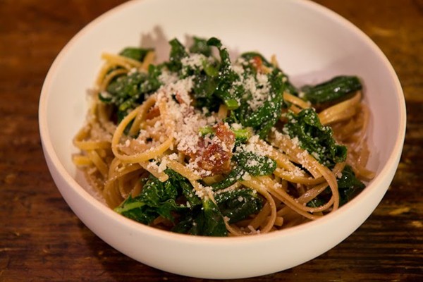 Spaghetti carbonara with garlicky greens