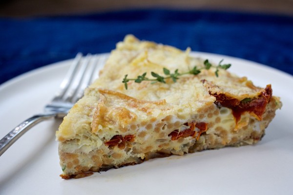 Spaghetti frittata with artichokes and sun-dried tomatoes