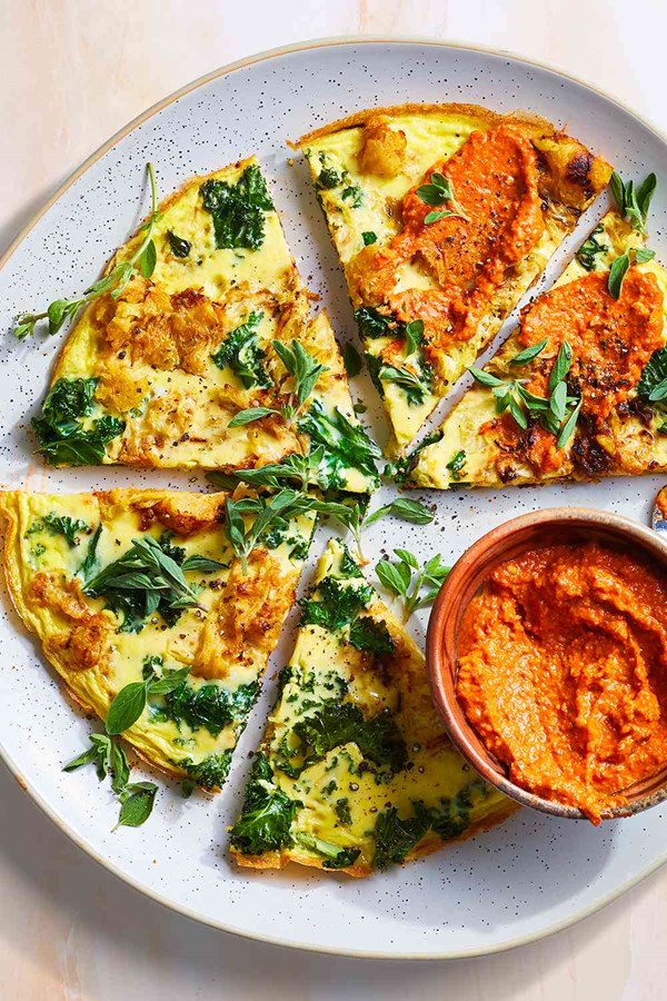 Spaghetti squash frittata topped with romesco