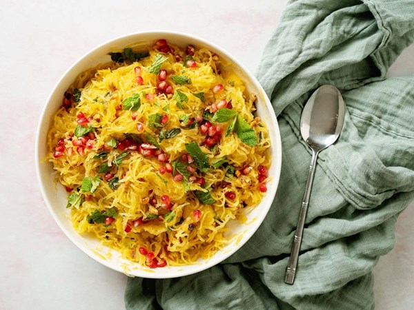 Spaghetti squash slaw with mint, hazelnuts, and pomegranate