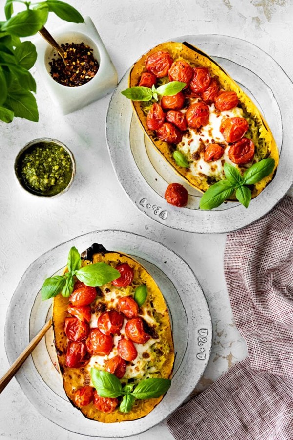 Spaghetti squash with pesto, mozzarella & roasted tomatoes