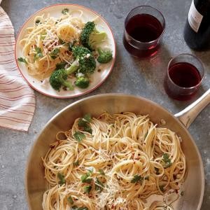 Spaghetti with anchovies, garlic, and red pepper with lemon-caper broccoli