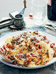 Spaghetti with bacon, capers, and mint