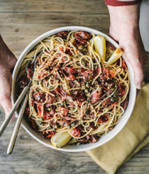 Spaghetti with capers, cherry tomatoes and lemon