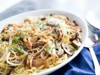 Spaghetti with caramelized onions, mushrooms and pancetta