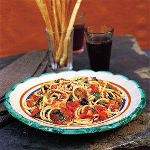 Spaghetti with eggplant, cheese, and tomato sauce (Spaghetti alla Norma)