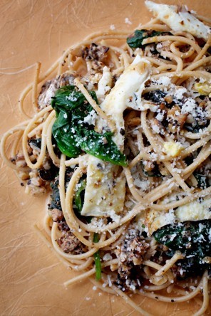Spaghetti with fried egg and sardines