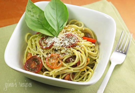 Spaghetti with garlic scape pesto with tomatoes