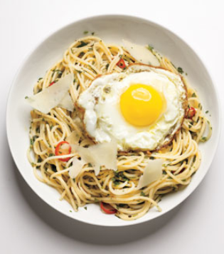 Spaghetti with herbs, chilies, and fried eggs