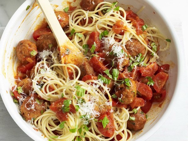 Spaghetti with meatballs and cherry tomatoes