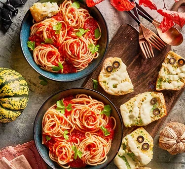 Spaghetti with mummified garlic bread